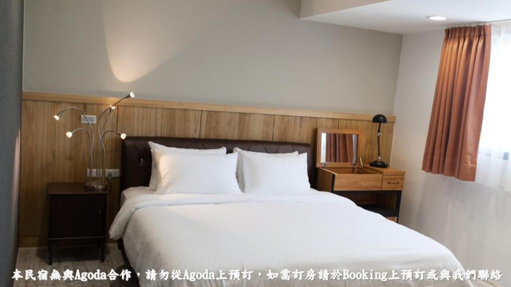 Voodi või voodid majutusasutuse 河岸香榭&田苑民宿 toas