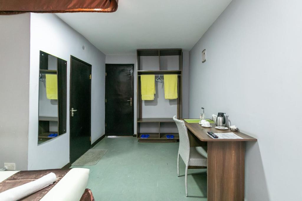 Kuchyň nebo kuchyňský kout v ubytování Kings Premier Inn