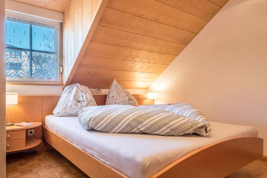 Postel nebo postele na pokoji v ubytování Apartment Vigl Lodge