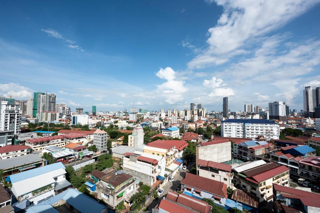 Nespecifikovaný výhled na destinaci Phnompenh nebo výhled na město při pohledu z hotelu