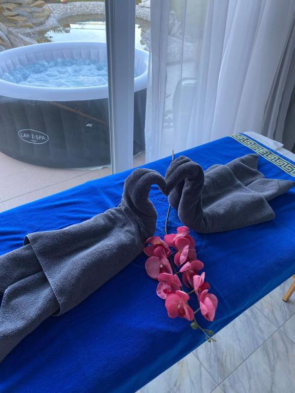Postel nebo postele na pokoji v ubytování SunVilla
