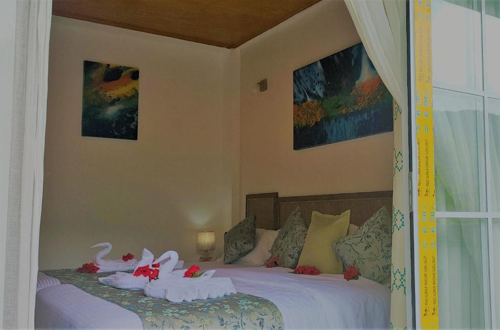Postel nebo postele na pokoji v ubytování Mountain View Hotel