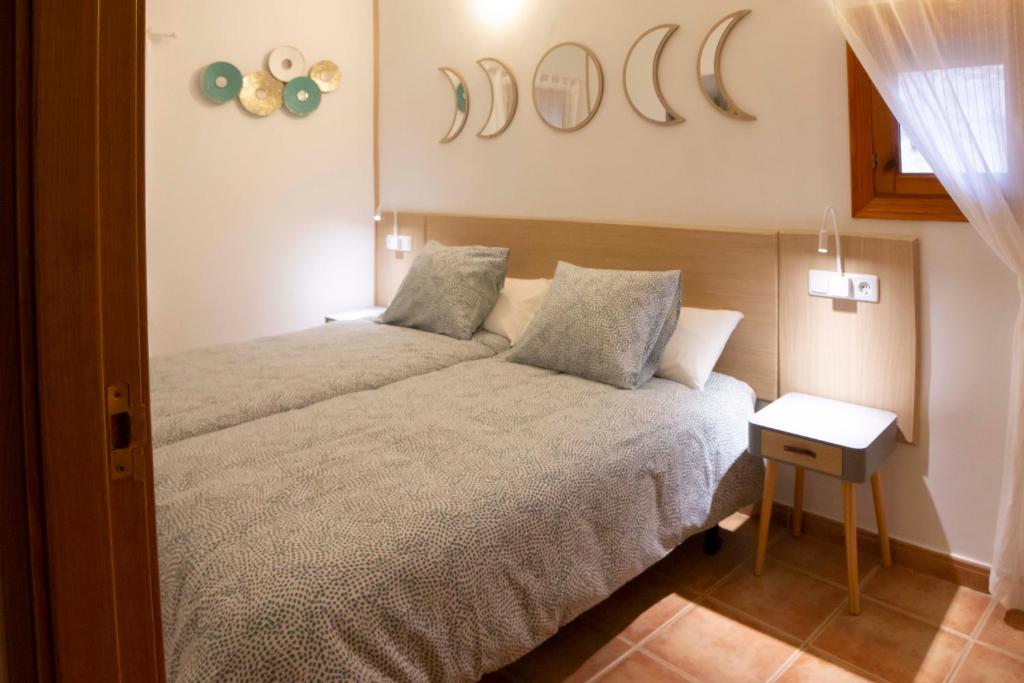 Postel nebo postele na pokoji v ubytování Apartamentos Erlueta