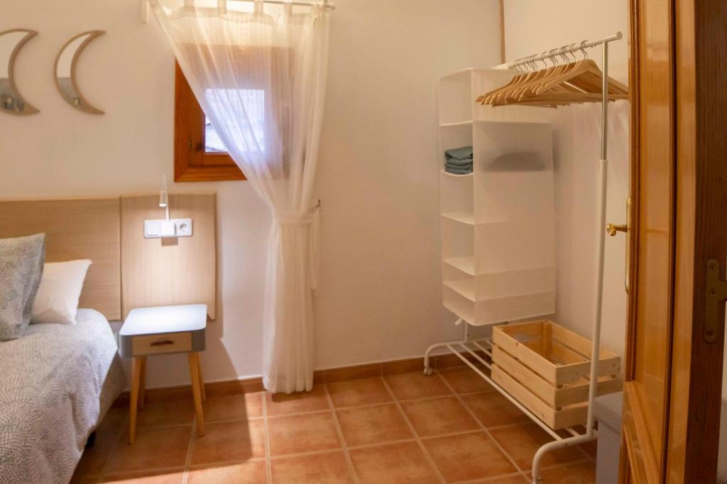 Postel nebo postele na pokoji v ubytování Apartamentos Erlueta