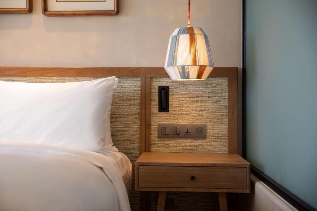 Giường trong phòng chung tại Radisson Resort Phan Thiet