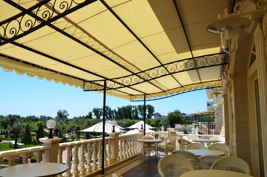 A balcony or terrace at Therma Palace - All inclusive & Private Beach & Free Parking