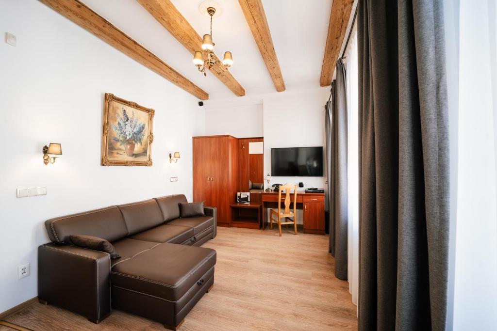 TV a/nebo společenská místnost v ubytování Hotel & Apartments Ventus Rosa