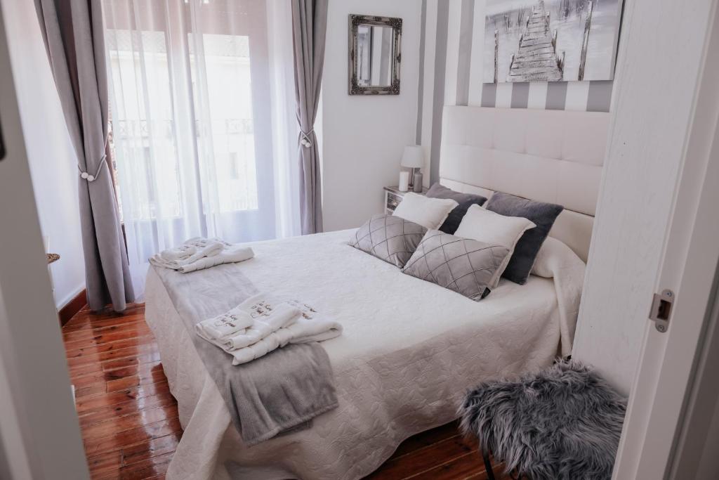 Postel nebo postele na pokoji v ubytování Casa Rural El Puente Grande