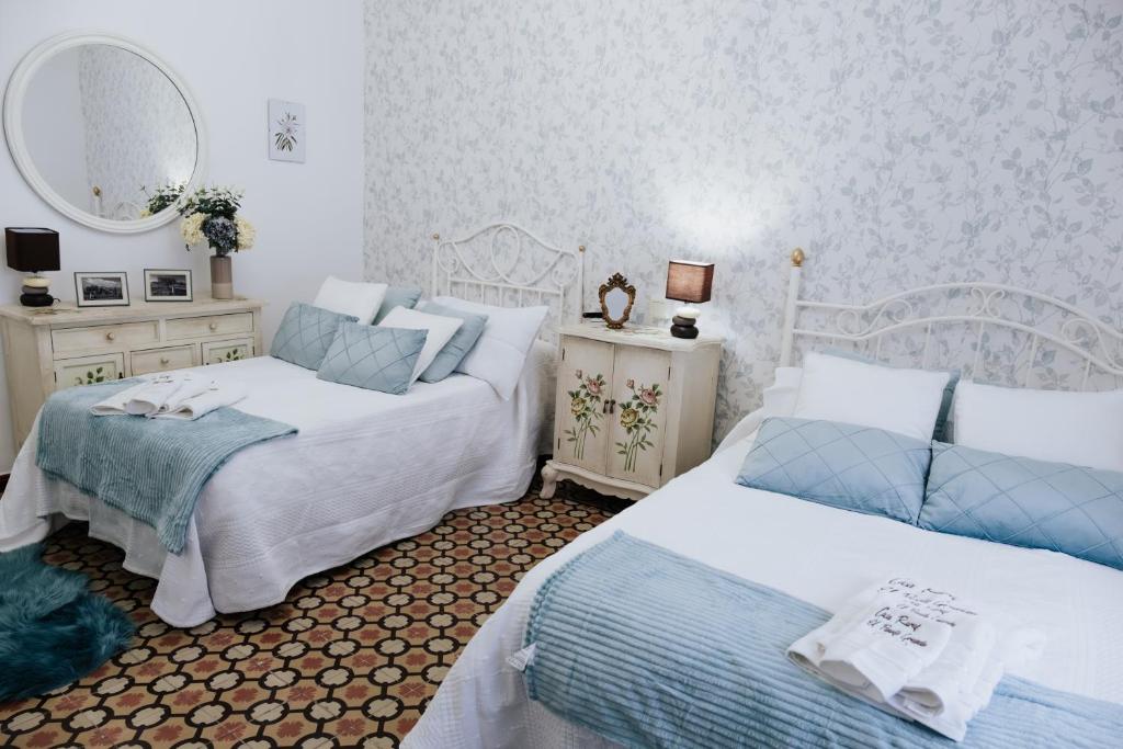 Postel nebo postele na pokoji v ubytování Casa Rural El Puente Grande