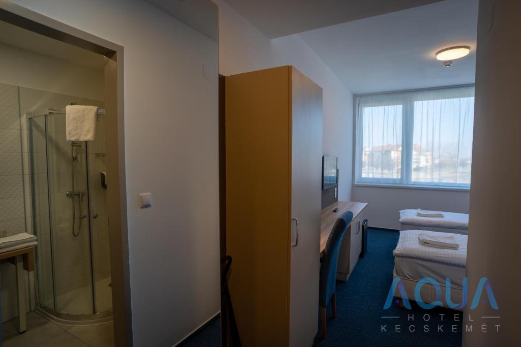 Koupelna v ubytování Aqua Hotel