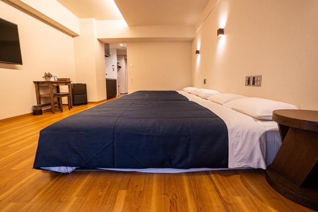 Postel nebo postele na pokoji v ubytování Hotel Iori