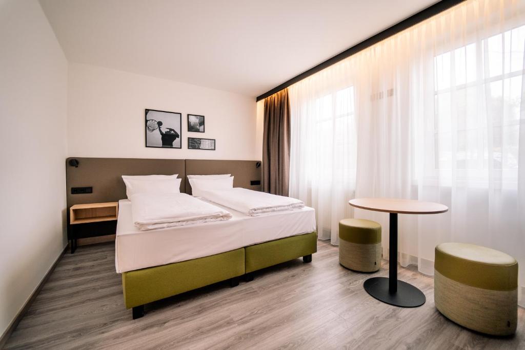 COURT HOTEL - Habitación Cuádruple Económica