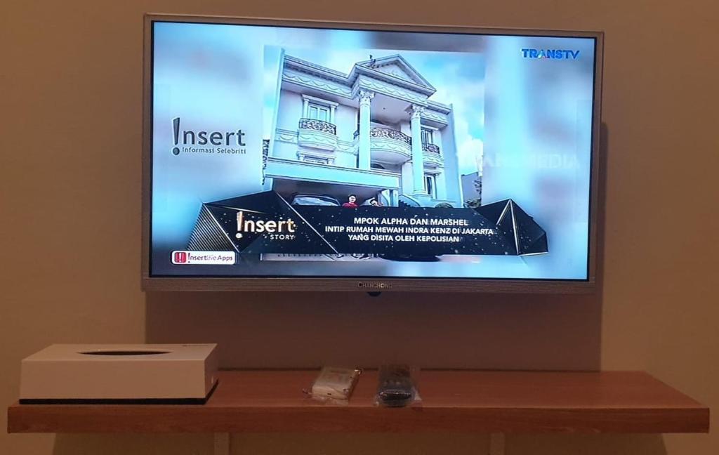 TV a/nebo společenská místnost v ubytování Alexandria12 Guest House