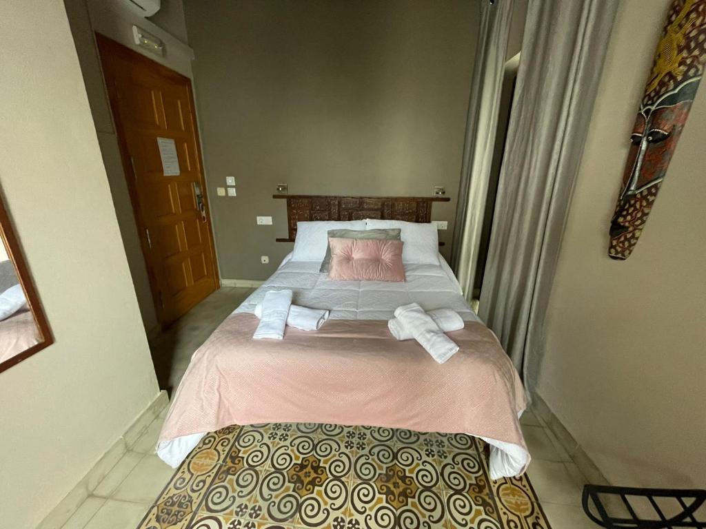 Postel nebo postele na pokoji v ubytování Vagamundos