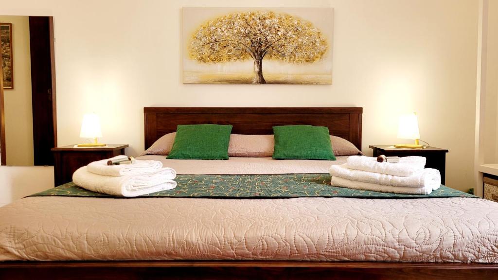 Ліжко або ліжка в номері Zanzi 's Charming Rooms