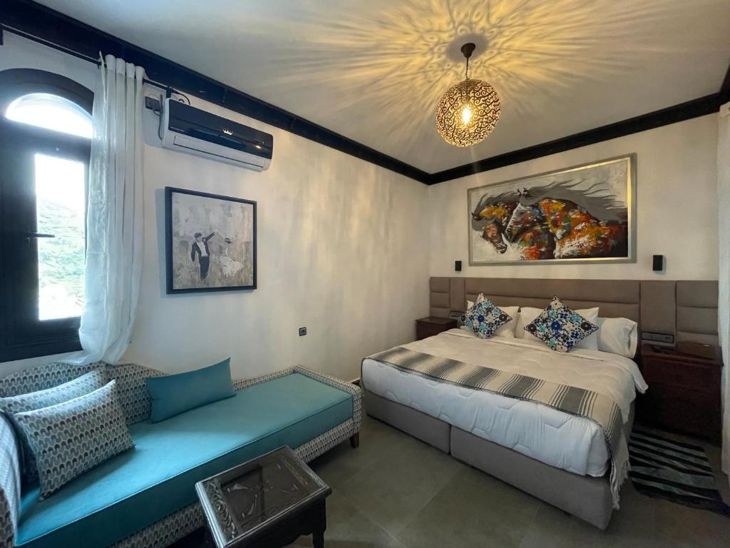 Postel nebo postele na pokoji v ubytování Riad El Palacio & Spa Chaouen