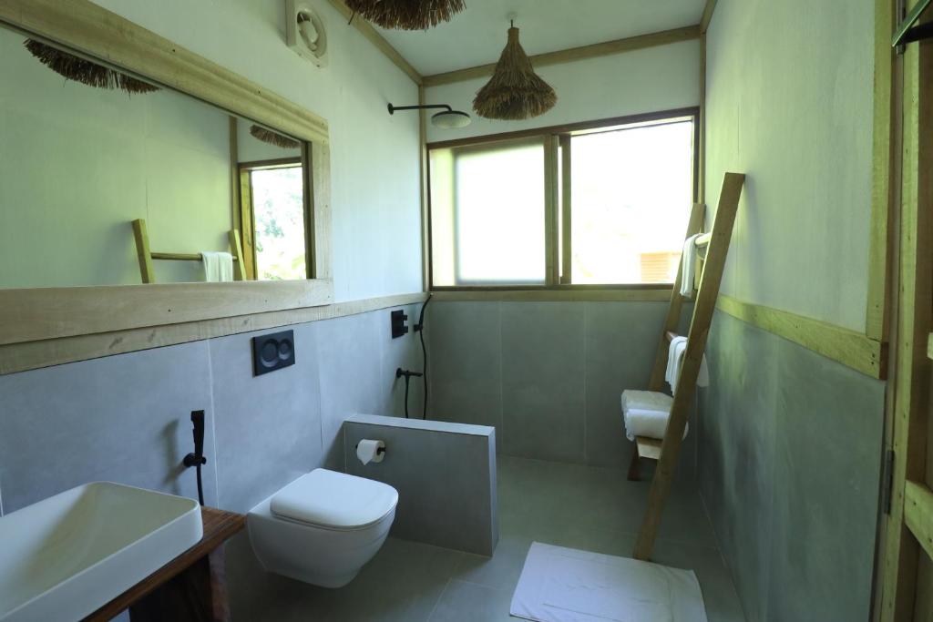 Koupelna v ubytování Satya Boutique Resort & Spa