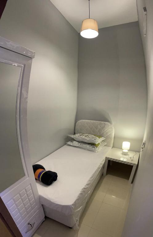 Postel nebo postele na pokoji v ubytování AlBarsha 1 Hostel by PHM