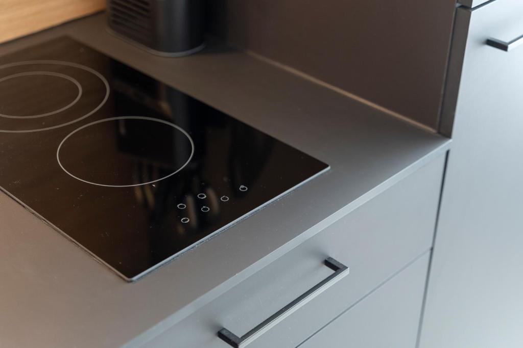 A kitchen or kitchenette at josef's home I Studio Mini I near UNO & VIC