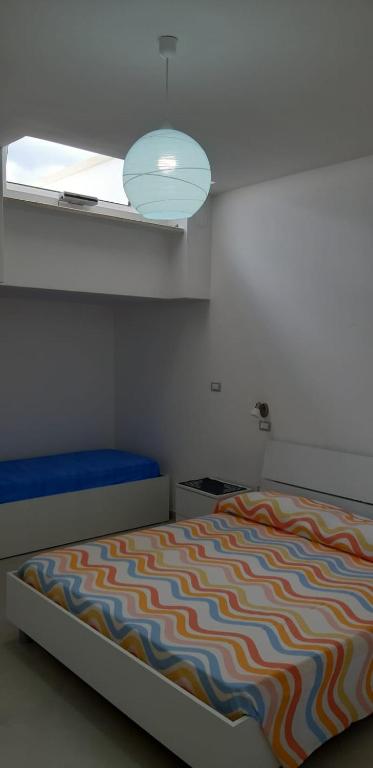 A bed or beds in a room at Casa Sole