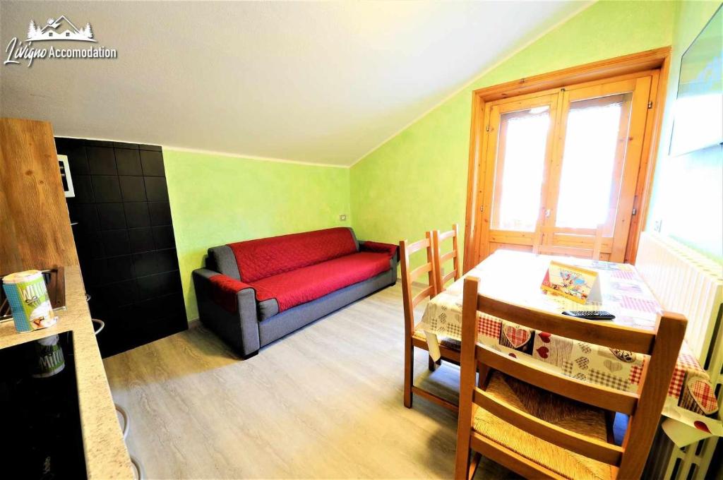 Postel nebo postele na pokoji v ubytování Residence Casa Longa by Livigno Accomodation