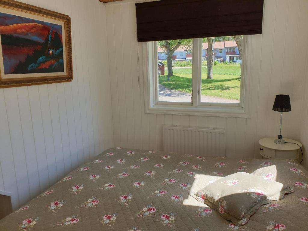 Postel nebo postele na pokoji v ubytování Nya Strandgårdens Wärdshus