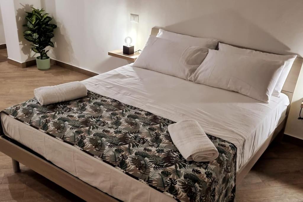 Łóżko lub łóżka w pokoju w obiekcie Christian Guest House
