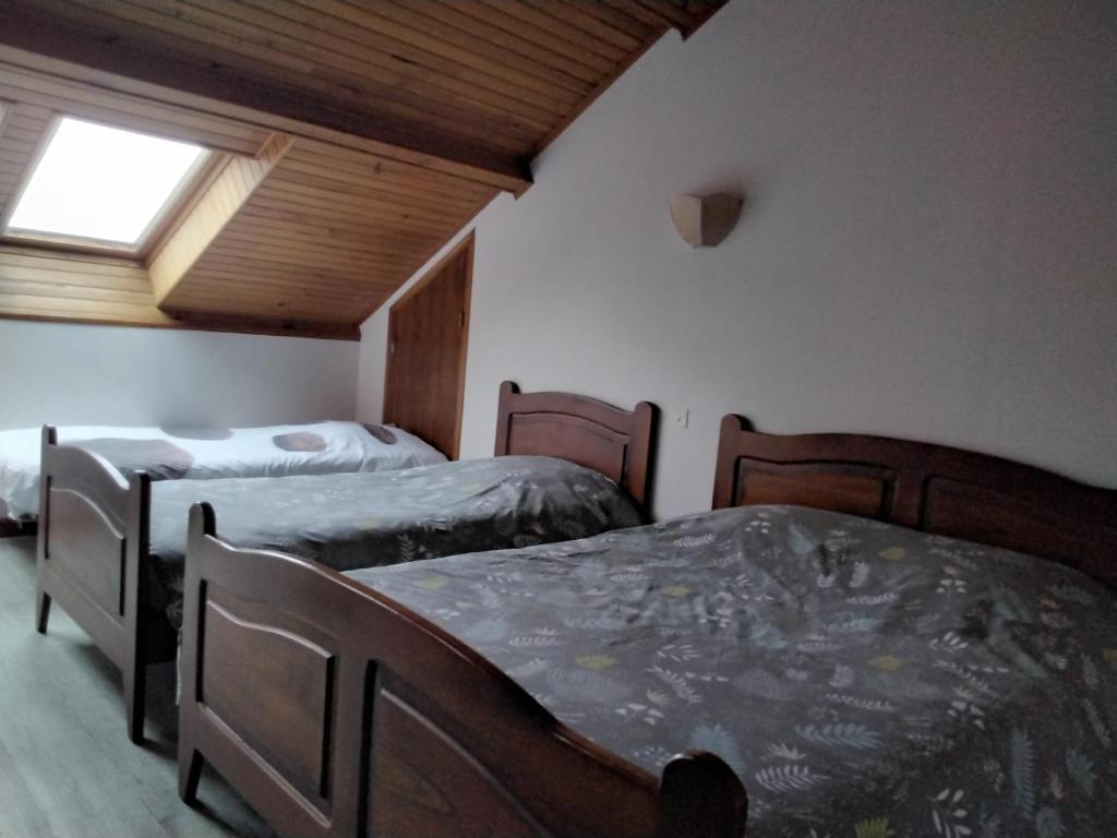 Postel nebo postele na pokoji v ubytování Le Relais des Sites