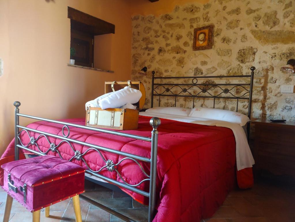 Postel nebo postele na pokoji v ubytování Agriturismo Le Faeta