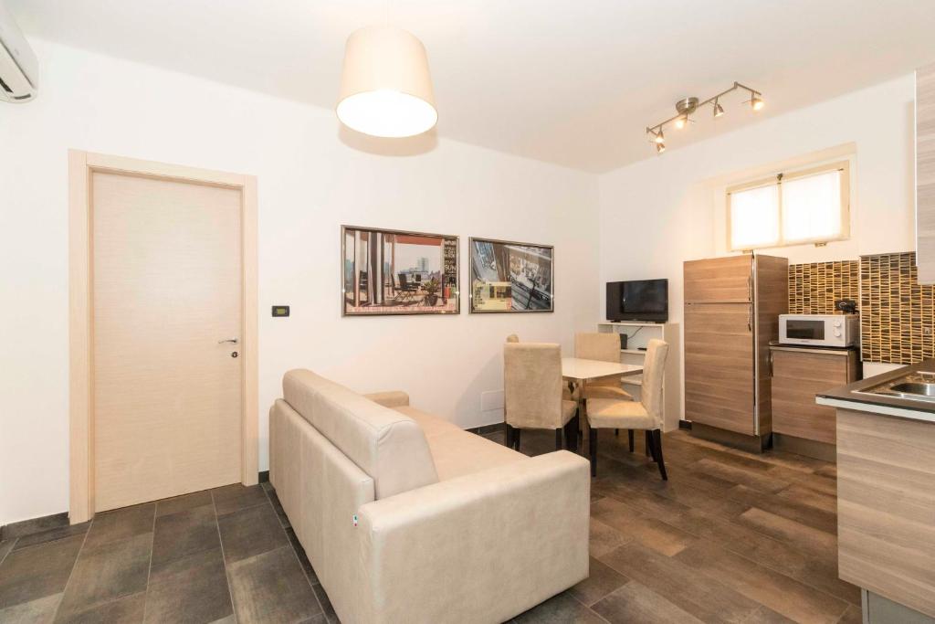 Televízia a/alebo spoločenská miestnosť v ubytovaní Piazza Vittorio Veneto Central Apartment