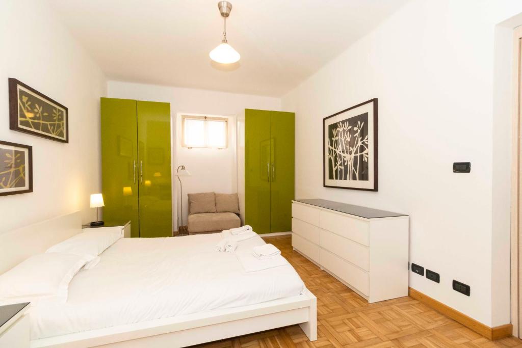 Posteľ alebo postele v izbe v ubytovaní Piazza Vittorio Veneto Central Apartment