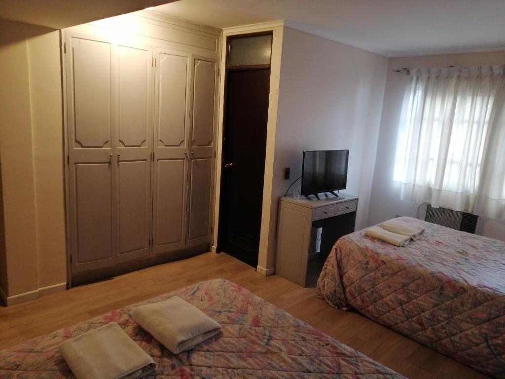 Postel nebo postele na pokoji v ubytování Hotel Cantamar