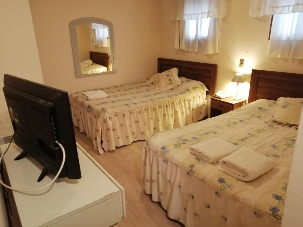 Postel nebo postele na pokoji v ubytování Hotel Cantamar