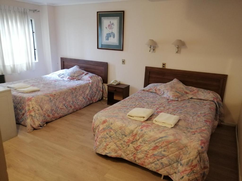 Postel nebo postele na pokoji v ubytování Hotel Cantamar