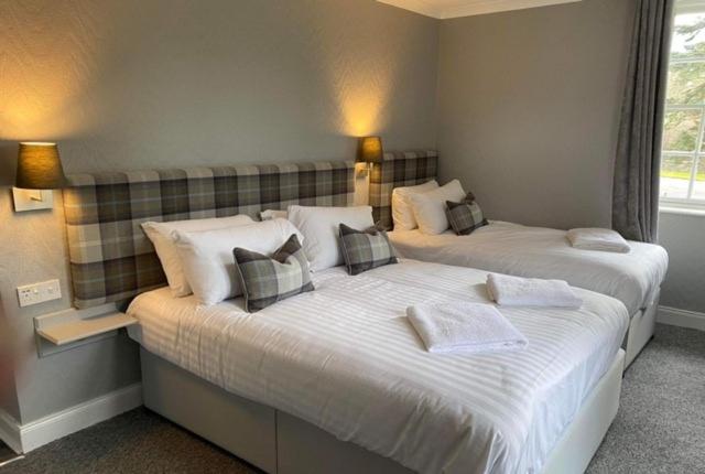 Postel nebo postele na pokoji v ubytování Isle of Skye Guest House