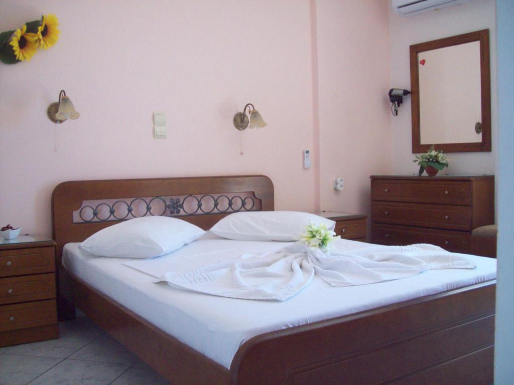 Postel nebo postele na pokoji v ubytování GARY APARTMENTS
