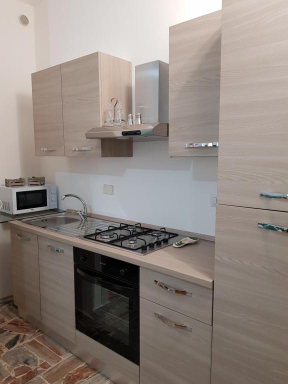 Kuchyňa alebo kuchynka v ubytovaní Bed & Breakfast La Tana dei Sognatori