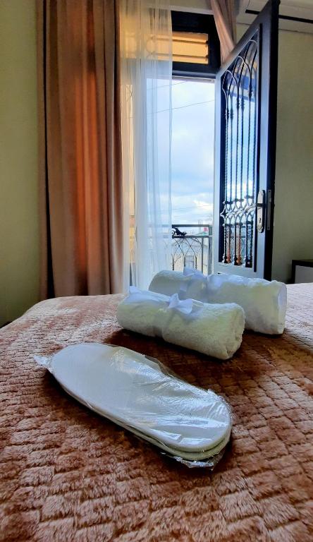 Postel nebo postele na pokoji v ubytování HOTEL KOSHKI