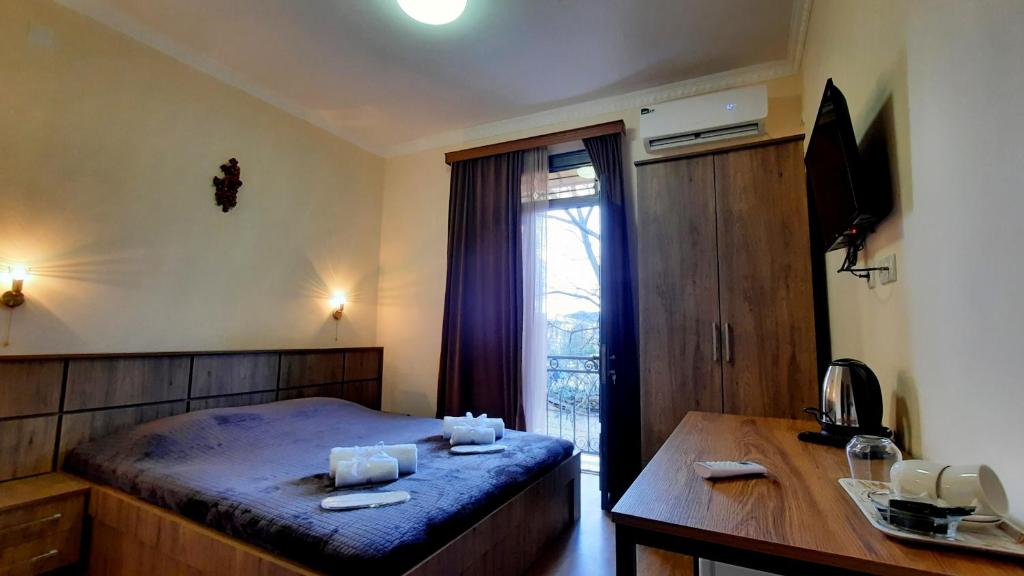 Postel nebo postele na pokoji v ubytování HOTEL KOSHKI