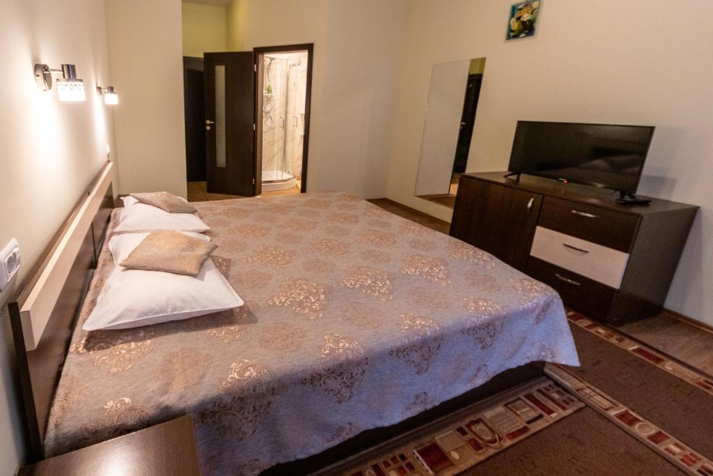 Postel nebo postele na pokoji v ubytování Pension Master