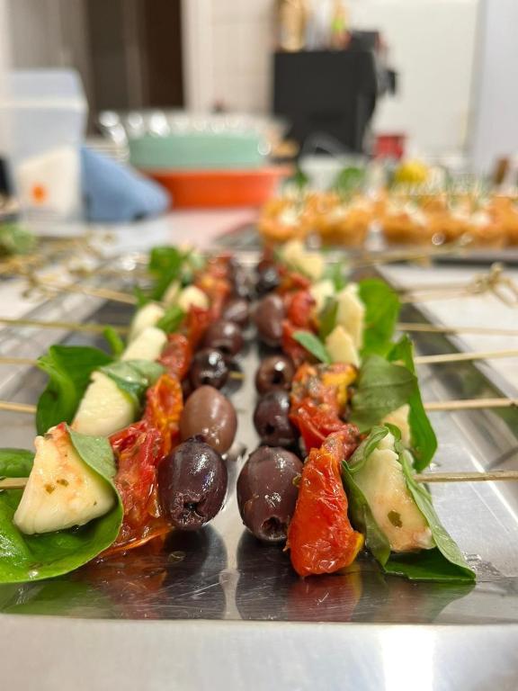 a tray of food with vegetables on a table at Bryn Noddfa in Morfa Nefyn