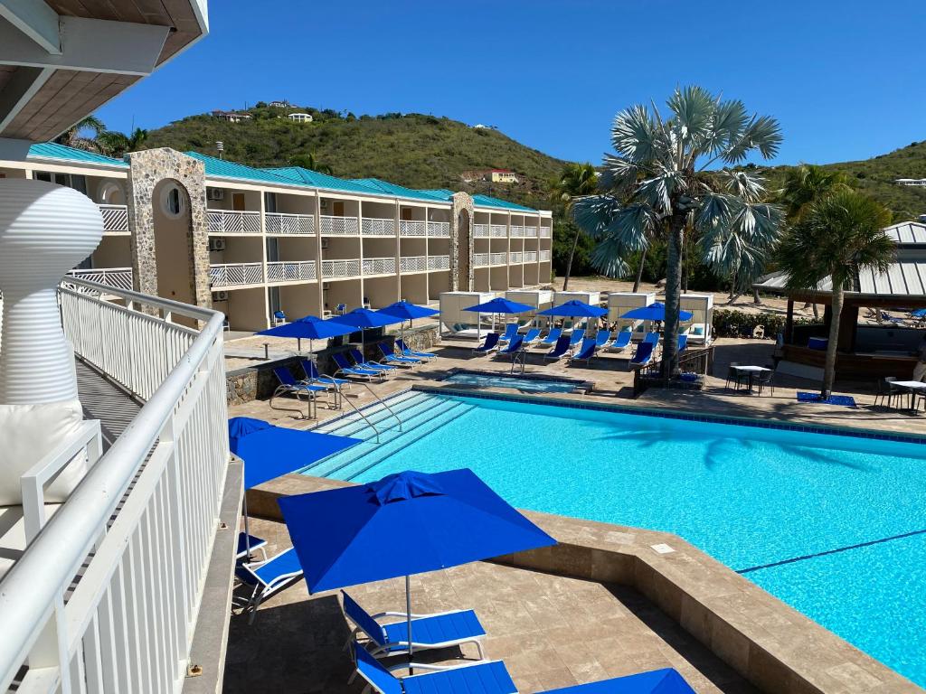 Bazén v ubytování Carina Bay Boutique All inclusive Resort & Casino nebo v jeho okolí