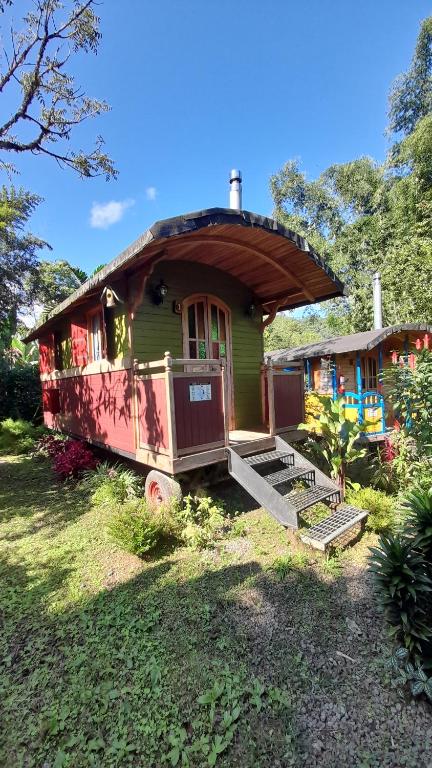 Zahrada ubytování Hosteria La Roulotte - Mindo