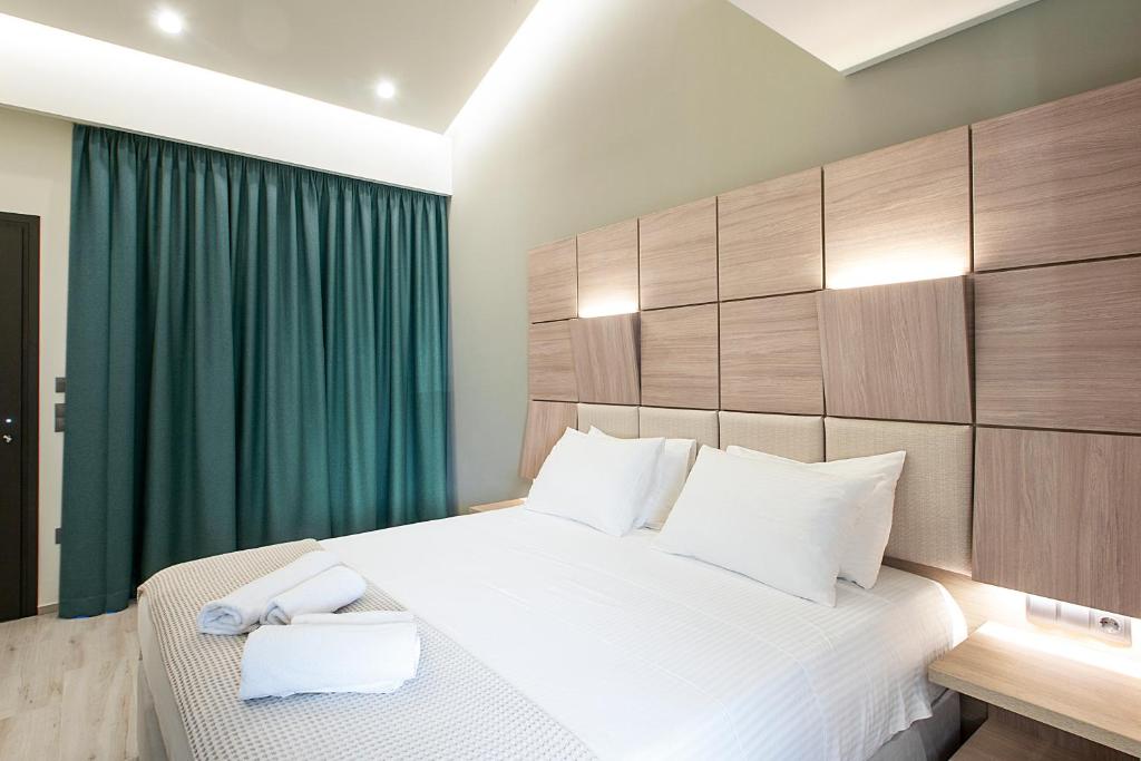 Postel nebo postele na pokoji v ubytování ALTHAEA LUXURY ROOMS