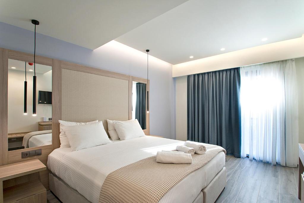 Postel nebo postele na pokoji v ubytování ALTHAEA LUXURY ROOMS
