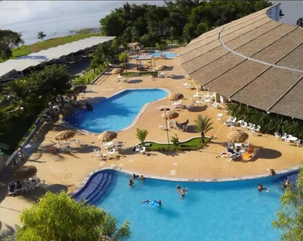 an aerial view of a pool at a resort at Apartamento Caldas Novas Enseada Nautico 203c in Caldas Novas