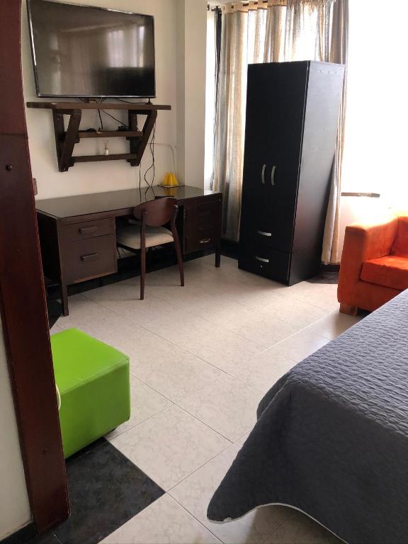 Postel nebo postele na pokoji v ubytování Apt estudio calle97301