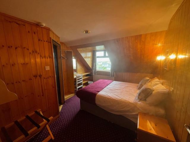 Postel nebo postele na pokoji v ubytování Ard Einne House Bed & Breakfast