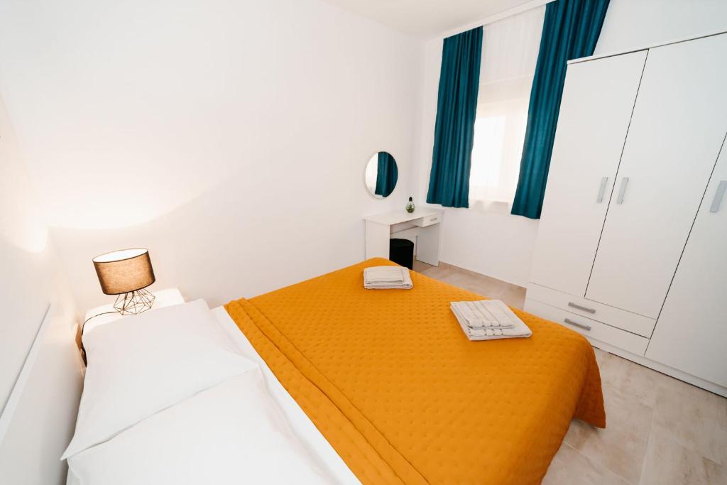 Postel nebo postele na pokoji v ubytování Apartments Seka