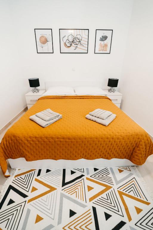 Postel nebo postele na pokoji v ubytování Apartments Seka